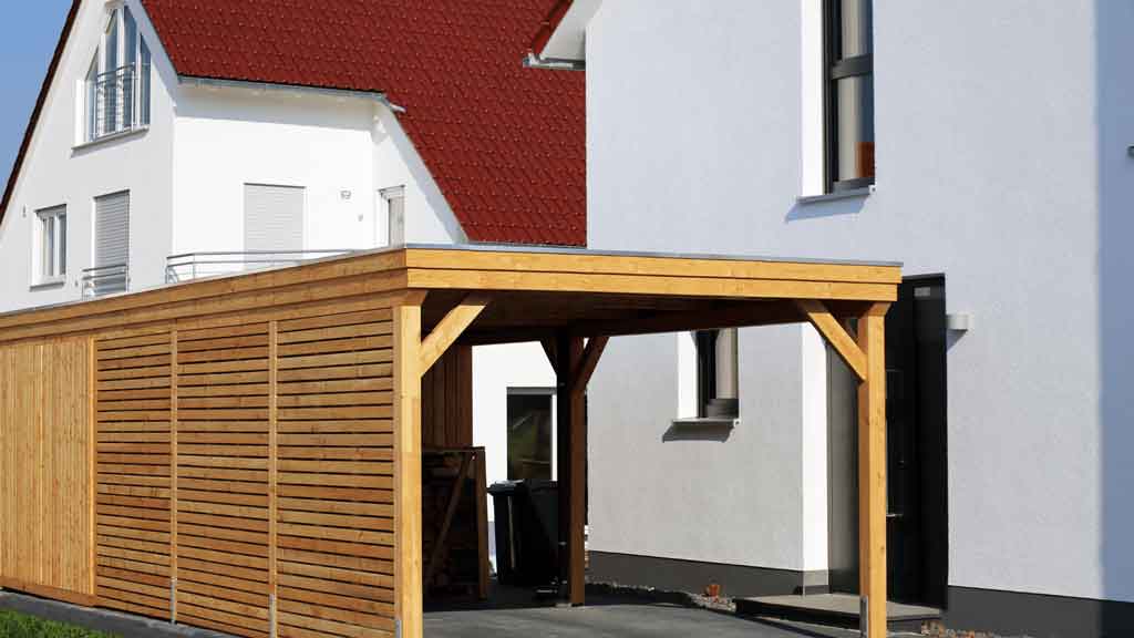 Steel carport builders at work, Central Coast