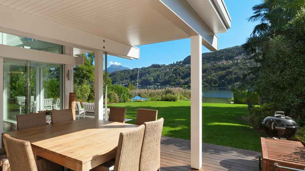 Patio builders completing a paved patio for a Central Coast home